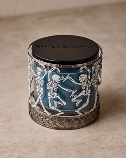 Glow-in-the-Dark Dancing Skeleton 3-Wick Candle Holder
